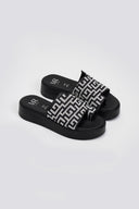 Flatforms ασύμμετρα σανδάλια με print
