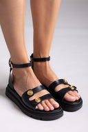 Σανδάλια δερμάτινα flatforms με μπαρέτα Tfp