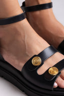 Σανδάλια δερμάτινα flatforms με μπαρέτα Tfp