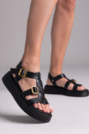 Σανδάλια flatforms δερμάτινα gladiator με τοκάδες Estil