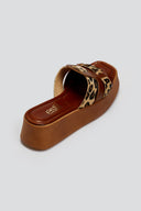 Σανδάλια flatforms δερμάτινα με ponyskin Estil