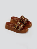 Σανδάλια flatforms δερμάτινα με ponyskin Estil