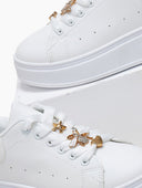 Sneakers flatforms με μεταλλικά στοιχεία